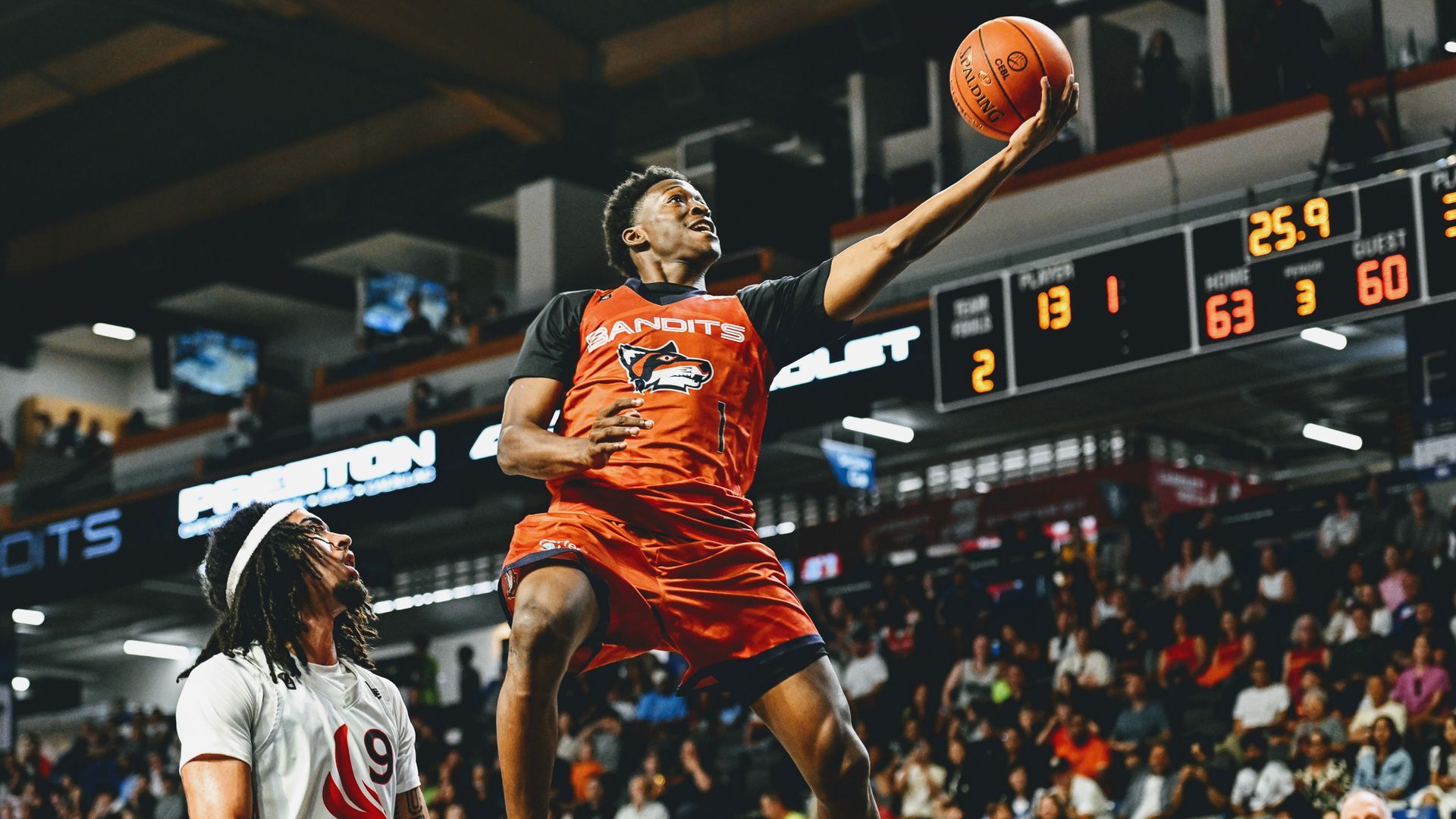 A Vancouver Bandits player rises toward the basket during a game